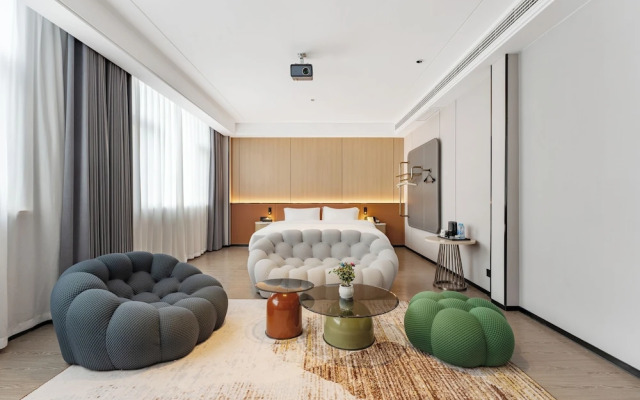 Wanzai Yijia La Maison Hotel