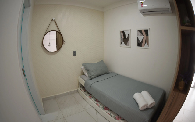 Pé na areia do Caribessa - Branco Haus