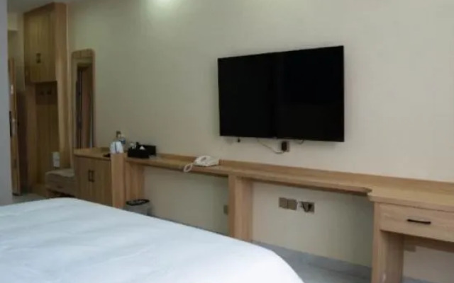 Grace Inn Qingju Hotel (Yanggu Wanhe City Branch)