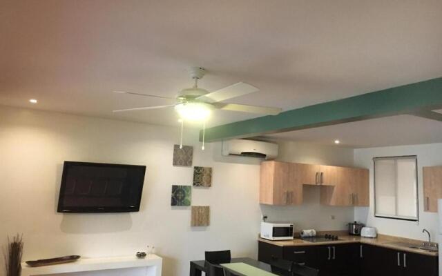 Tropical Gardens - Suites and Apartments