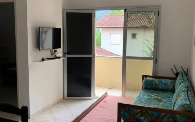 Apto c/2 quartos sendo uma suíte c/ar e 2banheiros