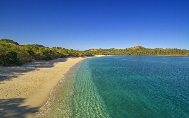 Peek-a-Boo Ocean view Condo at Reserva Conchal