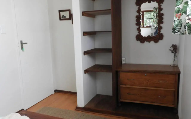 Cozy 4 bedroom house enclosed by sea and mountain.