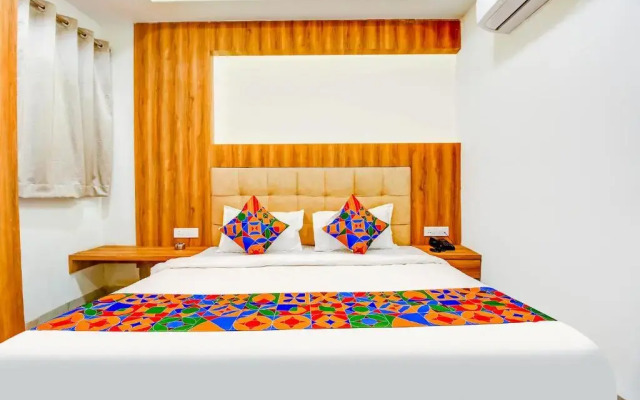 Fabhotel Prime Purple Orchid