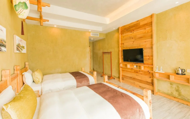 Floral Hotel Fenghuang Huercaowu