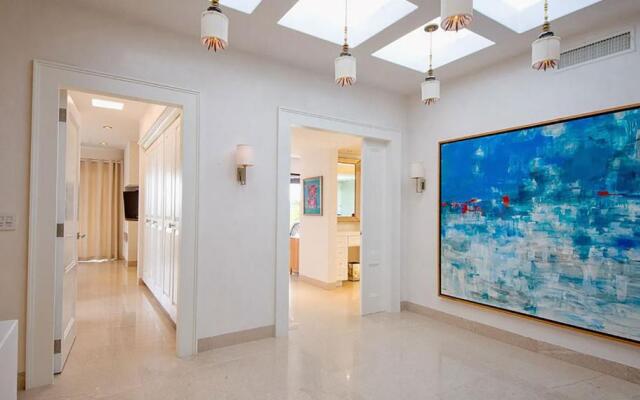Spectacular 3-Story Beachfront Villa with a Huge Pool Patio