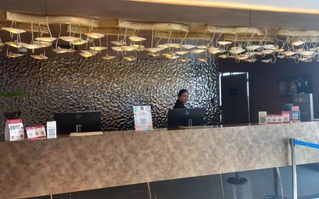 Capital O 950 Acqua Novotel Tower