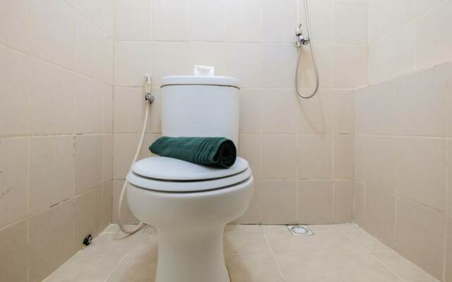 Monochrome Style 2 Bedrooms at Kalibata City Apartment By Travelio