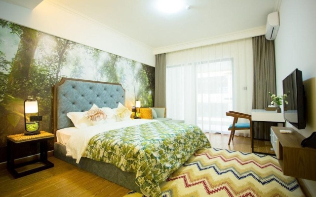 YUMI Apartment-Boshui Sq Branch – Guest Rooms – Xishuangbanna