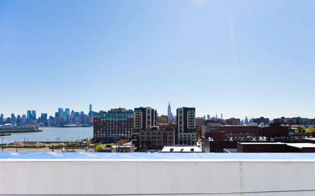 Dharma Home Suites Hoboken at Novia