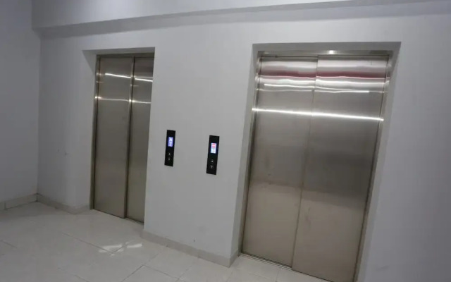 Capital O 95049 Aurora Rooms Riverdale