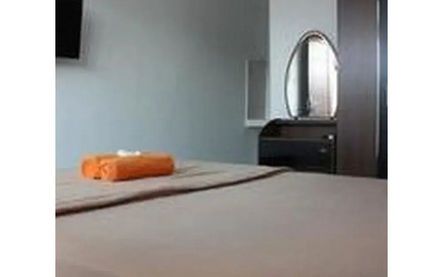 Nida Rooms Gelogor Carik Denpasar at Guest House Orchid