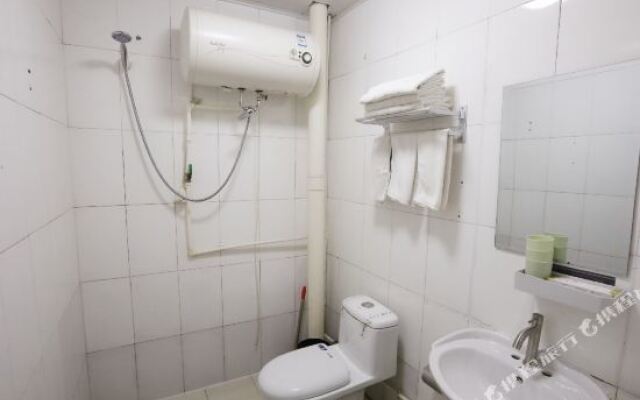 Penglai Xinlang Business Hotel