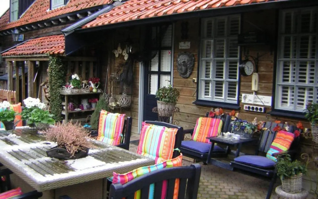 Prive tuinhuis B&B Elly