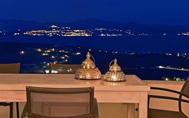 Panoramic three villa complex with helipad by VillaRentalsgr