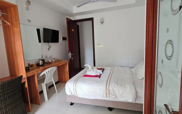Palm Rest Hotel