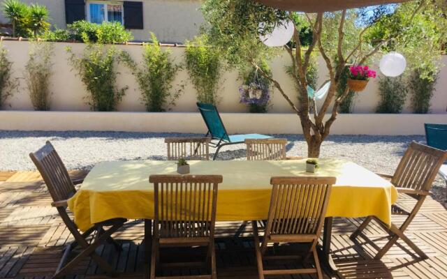 RDC dans maison "ilolil" a 1km plage de la Coudoulière