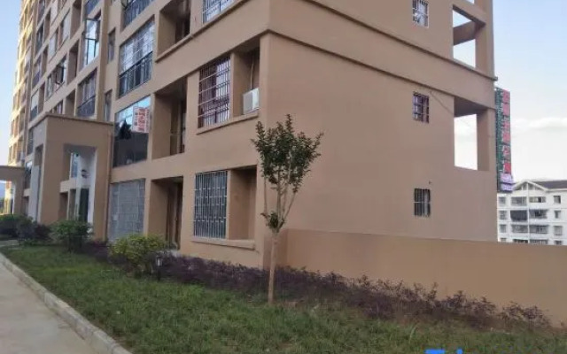 Wuchuan Aicheng Theme Apartment