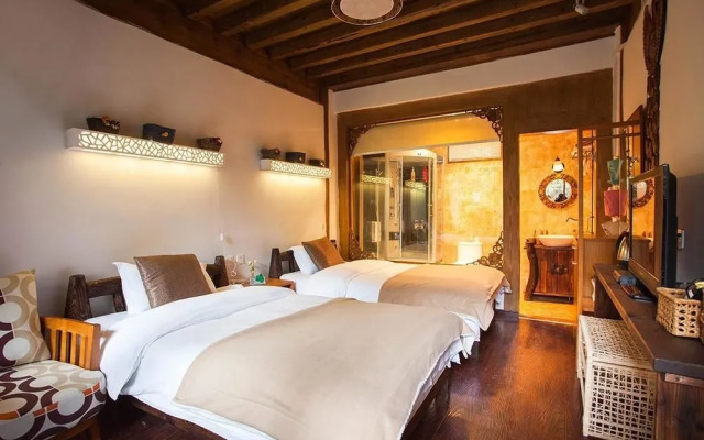 Lijiang Sancunriguang Inn