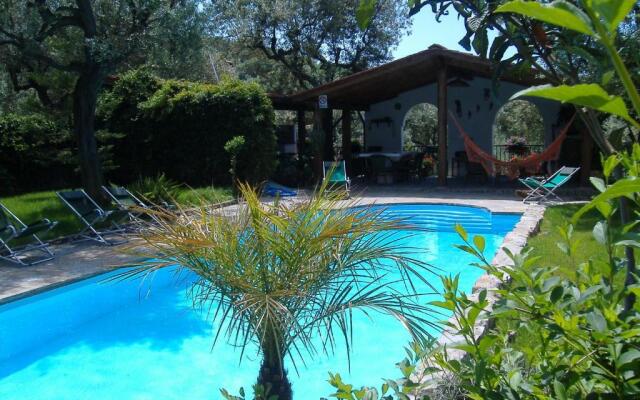 Appartamento in Villa con Giardino privato e piscina