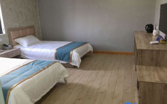 Pinghu liduo sheng business hotel