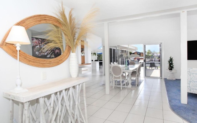Outstanding Waterfront Hamptons Style 5 Bedroom Luxurious Home with Air Conditioning Pool and Pontoon -Bring your own boat – Balcony – Minyama