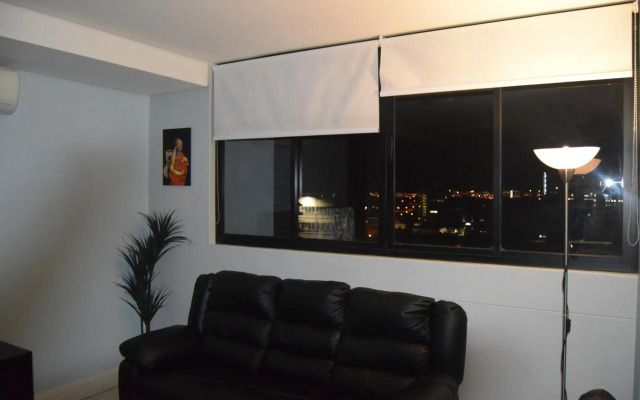 Highrise Windhoek apartment with skyline view, pool and gym