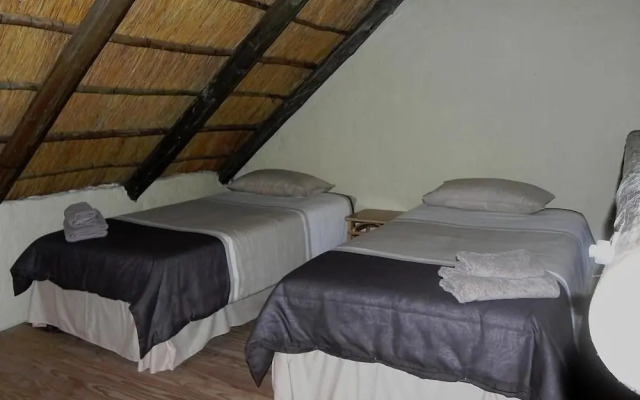 Kwambali Riverside Lodge