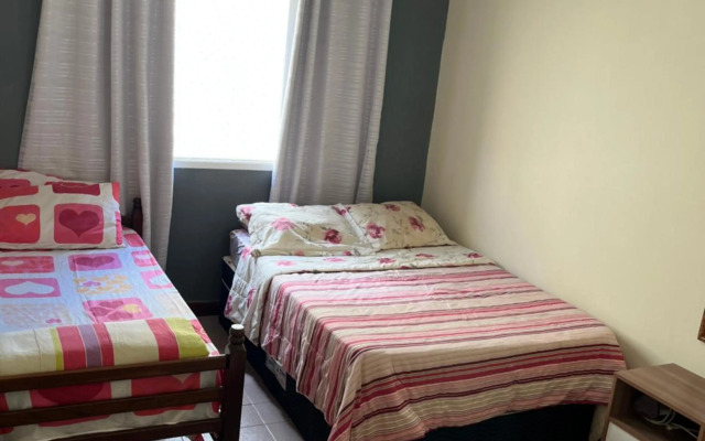 Apt TOTA 3 min Praia grande piscina e churrasqueira