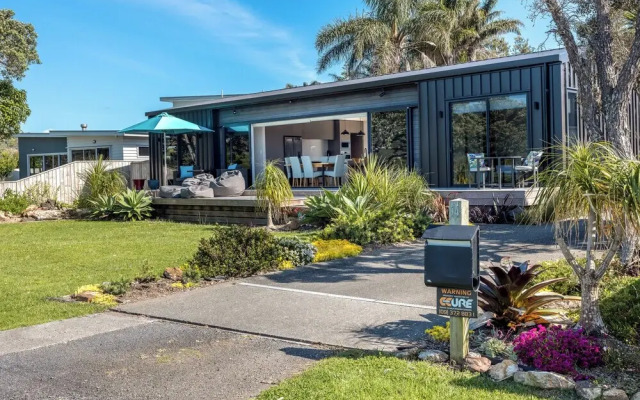 The Golden Pohutukawa Beach House