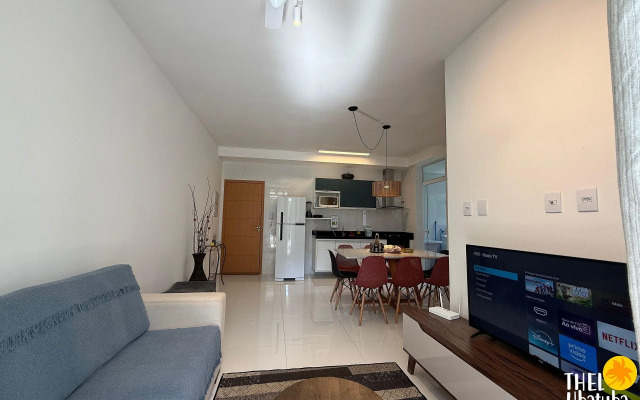 Apto completo e confortável com roupa de cama nas Toninhas  Condomínio Lumière