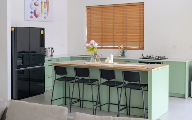 Tropical Poolside Retreat by Sea N' Rent