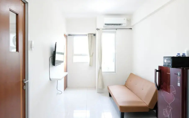 Modern And Homey 2Br At Puncak Kertajaya Apartment