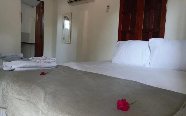 Canoa Hostel e Suites