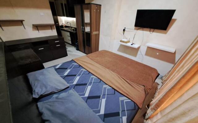 Capital O 93481 Apartement Grand Asia Afrika By Kelola Room