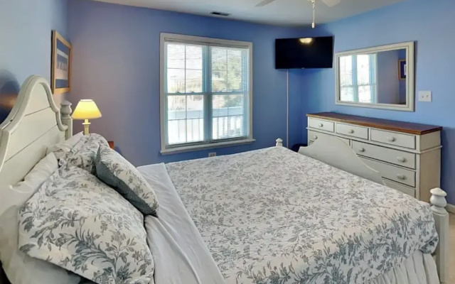 A Charm of Finches by Topsail Realty