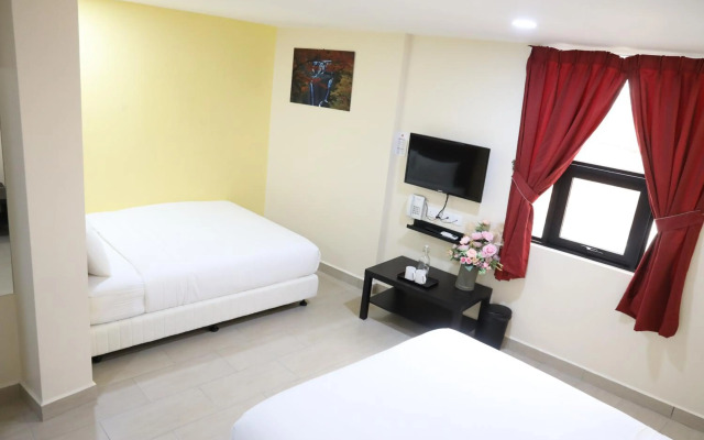 Capital O 90897 Island City Hotel