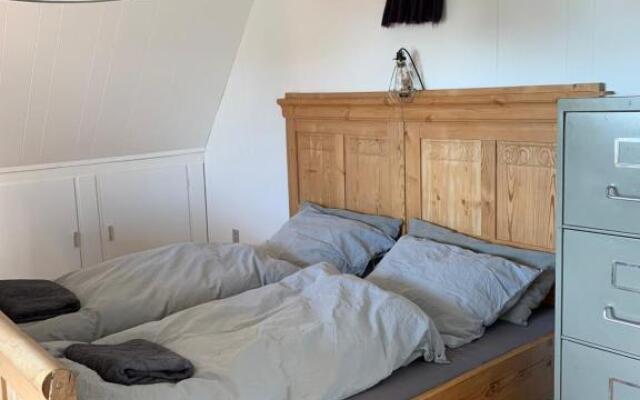 Selvbetjent lejlighed i centrum ved åen