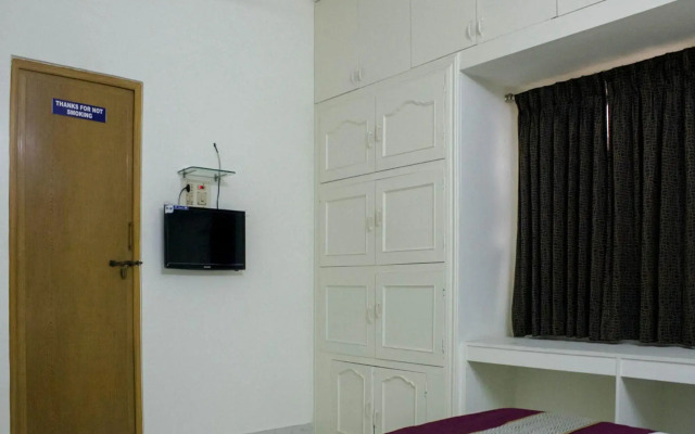 Rose Flower Service Apartment by OYO Rooms