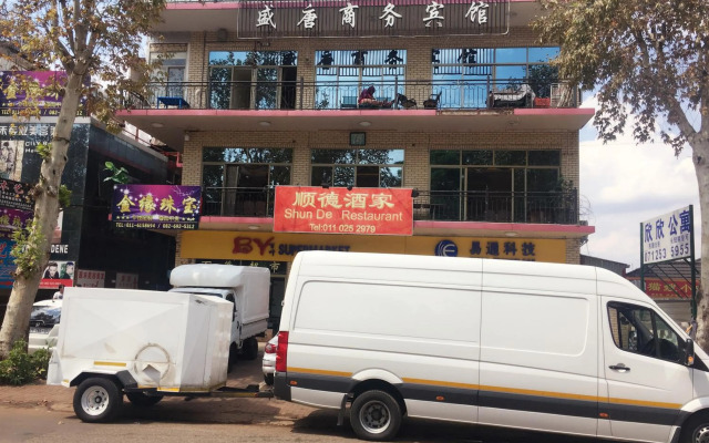 Shengtang Business Hotel