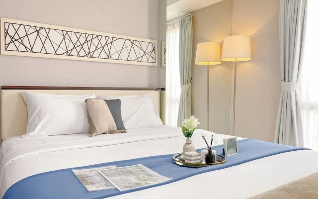 Spacious And Cozy Living Studio At Azalea Suites Apartment