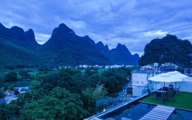 Huaye Travel Designer Hotel (Yangshuo Yulong River Resort Eternal Love Branch) – Outside – Guilin