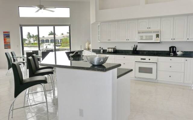 Waterfront Home on key lot With Pool, spa and Views