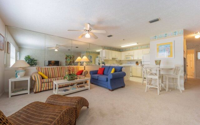 Sun Kissed Beachside Condo With Pool