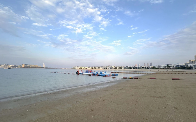 Palm Living 2BR Maid w Pool Beach Access