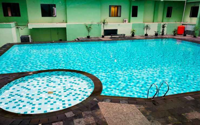 Comfy and Private 2BR at Menteng Square Apartment By Travelio