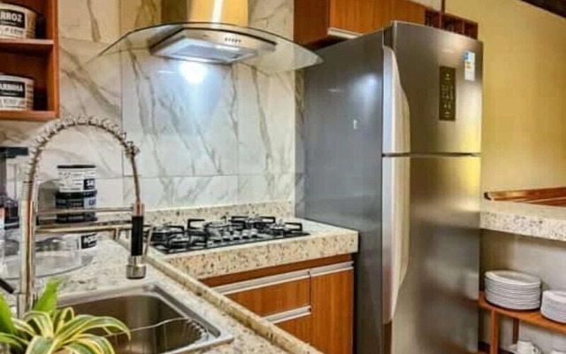 Casas e Suites Aconchego