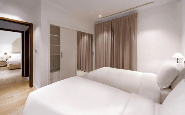 Mina Hotel and Residences By the Torch