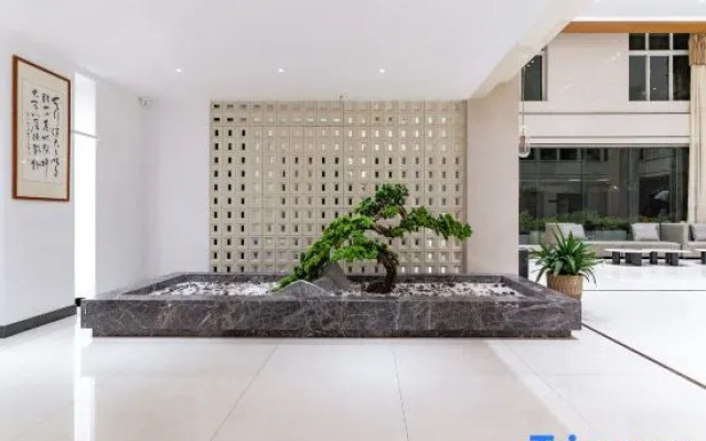 Lijiang Beisili Hotel (Gucheng Zhongyi Market Mufu)