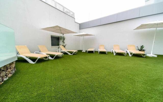Ocean Garden Suite 11 con jardín privado